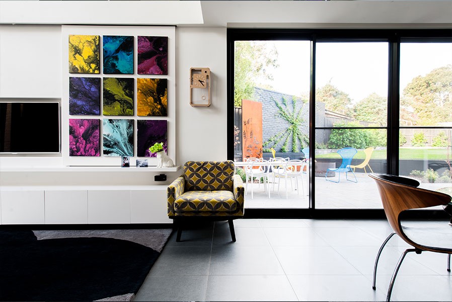 Large white aluminium window in bedroom